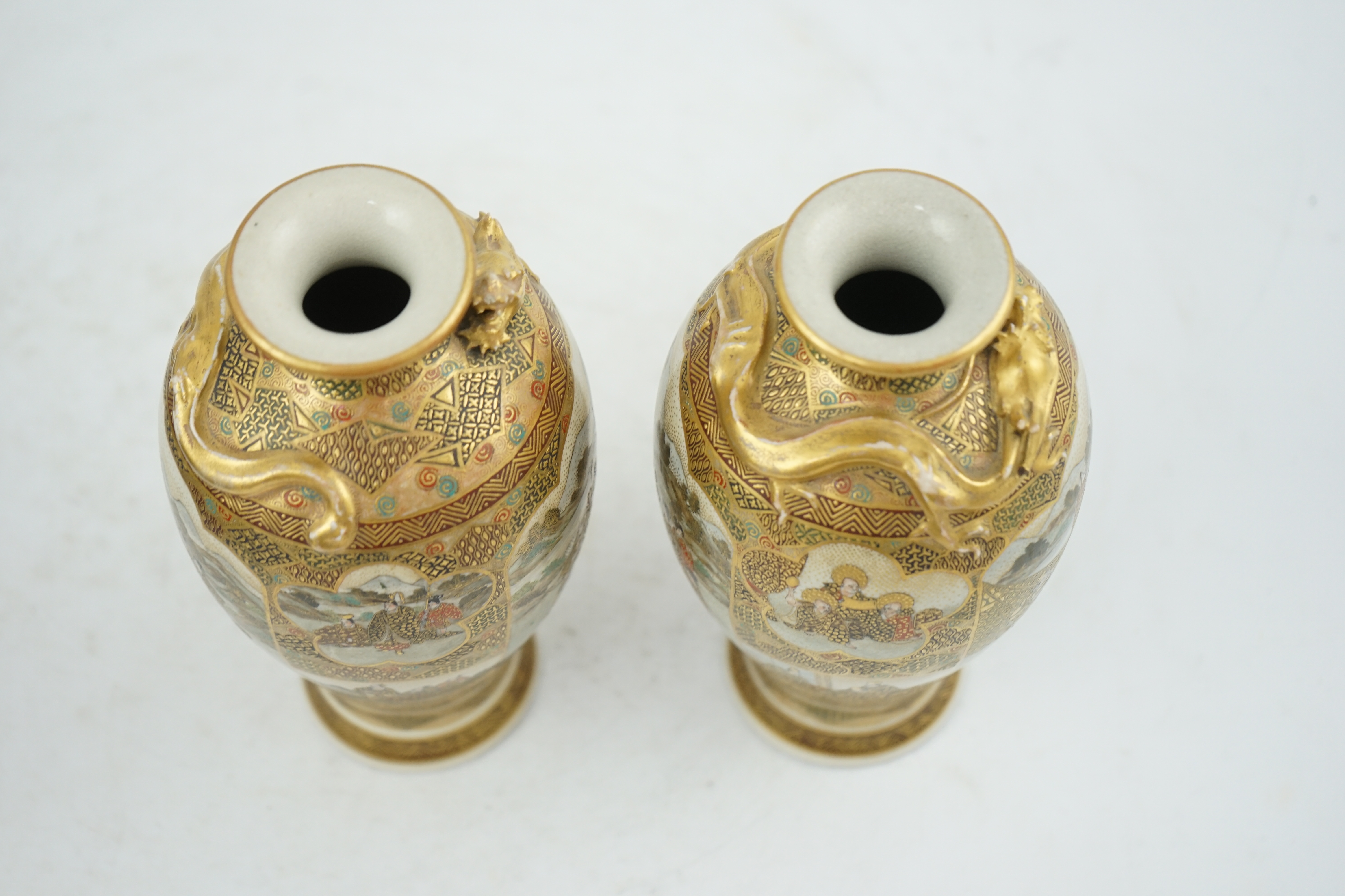 A pair of Japanese Satsuma 'dragon' vases, Meiji period